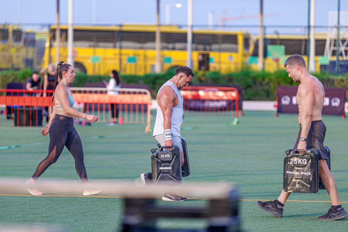 An athlete running the loop past the stations at a Primal race