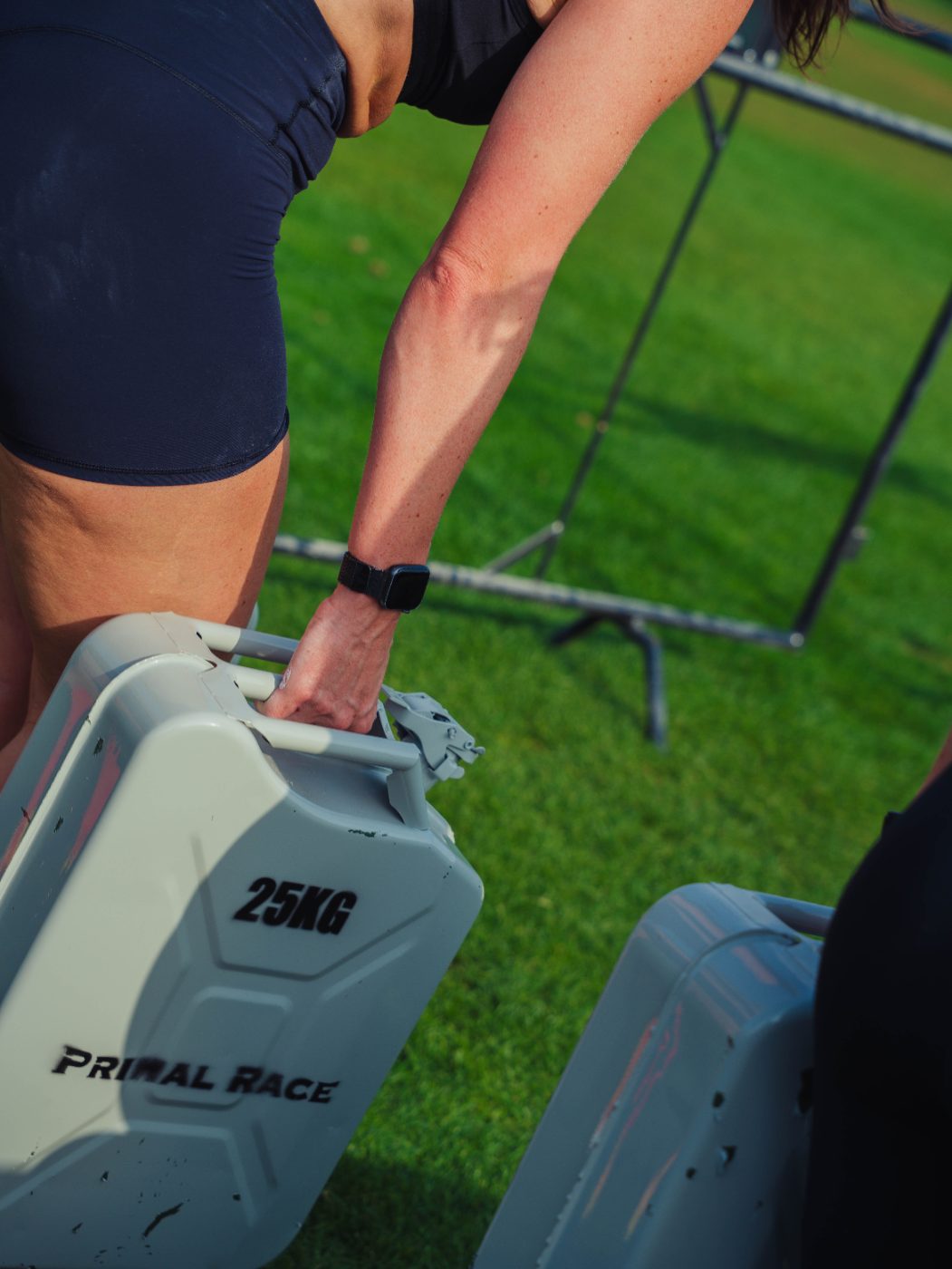 A 25kg canister on the grass at a Primal race