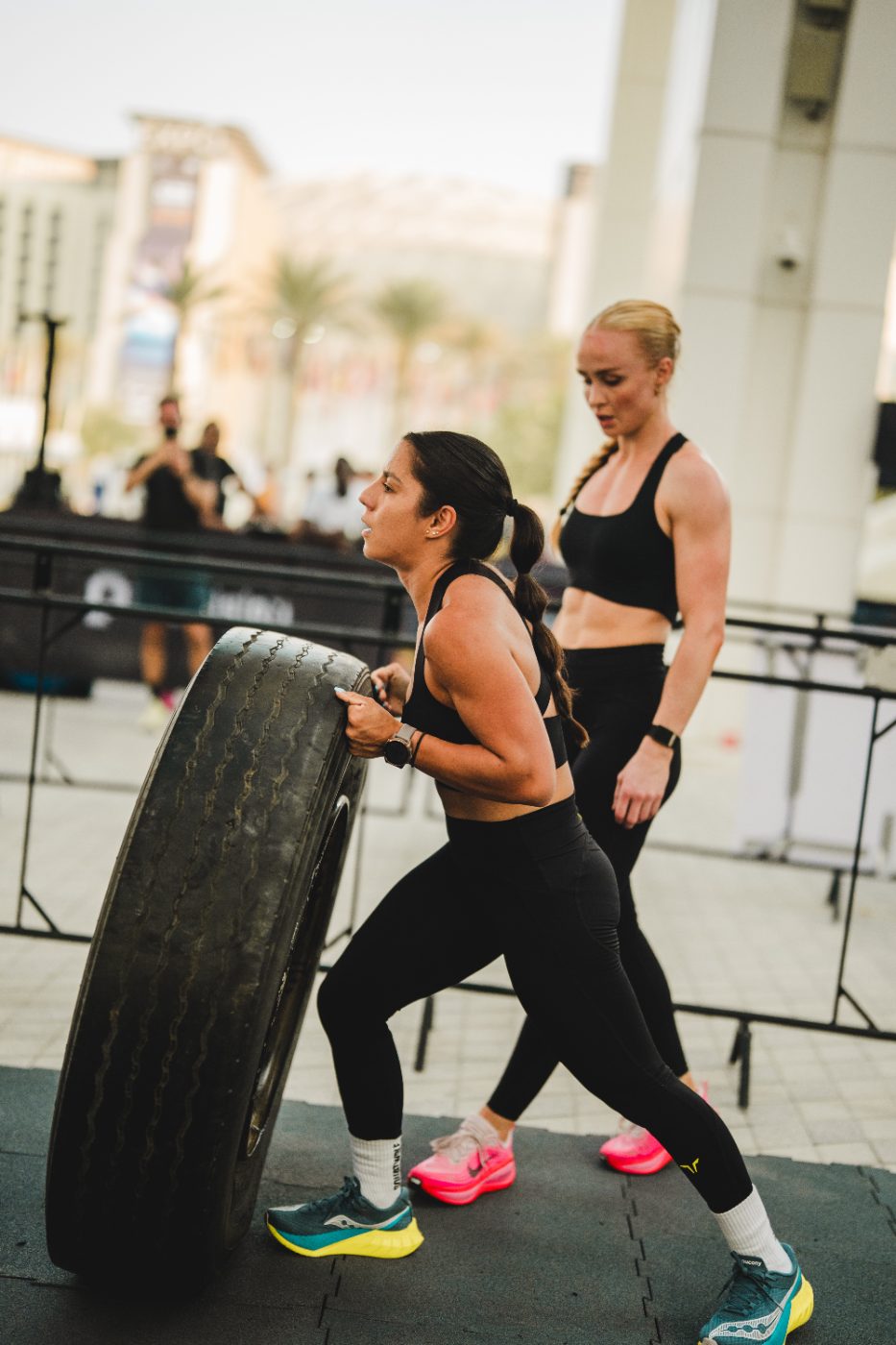 An athlete carrying the tyre at a Primal race